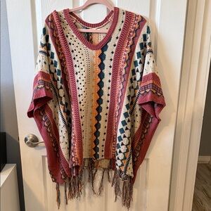 Easel V-Neck Sweater with Pink, Cream, and Blue Patterns